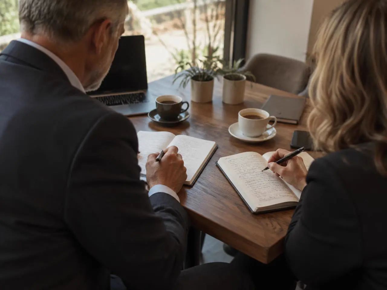 Founder and coach discussing priorities and a 90-day action plan